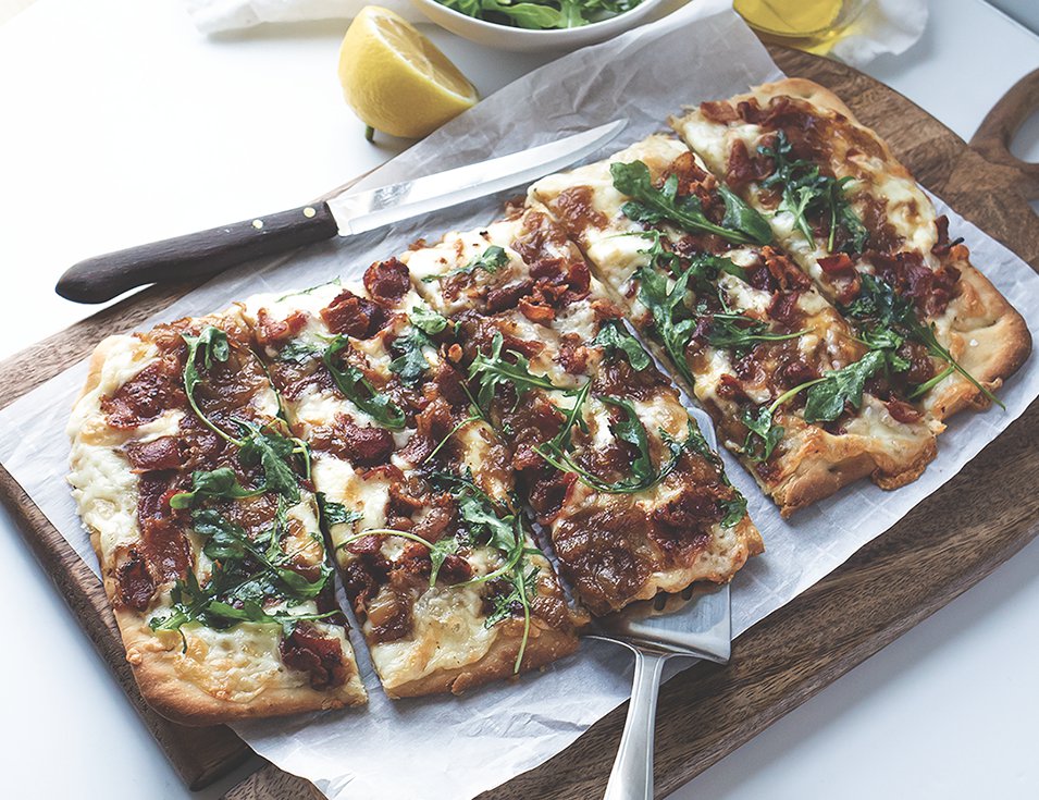 Flatbread with Caramelized Onions Bacon and Arugula.png